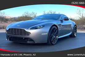 Image result for Titanium Silver 2011 Aston Martin