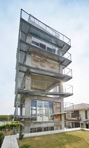 Kaniue Architects Wraps Steel Ramp Around 15m High Kugenuma Y House In Japan Ramps Architecture Architect House Near The Sea