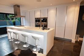 Contemporary kitchens that feel more like living areas than cooking spaces are a welcoming decorating trend. Contemporary White Kitchen Contemporary White Kitchen Island Design Discover More At Www L Luxury Kitchen Design White Modern Kitchen Modern Kitchen Island