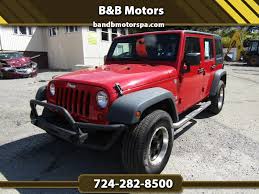 Image result for Flame Red 2009 Jeep