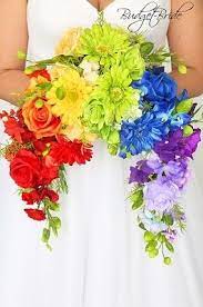 Wintry red bouquet for wedding at terrain at styers in glen mills, pennsylvania. Rainbow Theme Wedding Flower Bouquet Rainbow Wedding Flowers Rainbow Bouquet Rainbow Wedding Theme