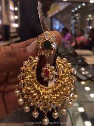 Intricate patterned neckwear and earrings set with kundan stones set in 22 karat yellow gold. Pin On Earrings