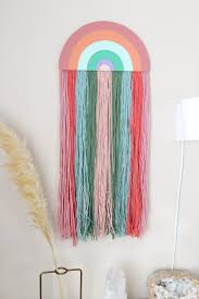 Trim the yarn in desired shape and hang up. 9 Diy Yarn Wall Hangings For A Boho Touch Shelterness