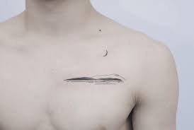 Island Tattoo With A Crescent Moon Above Inked On The Left Side Of The Chest Island Tattoo Tattoos Cool Chest Tattoos