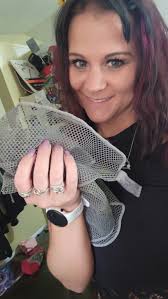 Oatcake's preferred loaf sitting spot is a cleaning mat