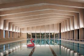 Hawkinsbrown Uses Engineered Wood To Build School Swimming Pool Swimming Pool Designs Indoor Swimming Pools Dream Pool Indoor