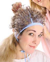 A highlighting cap made from a light plastic or a little heavier silicone is positioned onto the head over the hair. How To Get Best Results When Highlighting Hair With A Highlighting Cap Frosting Cap Or Tipping Cap