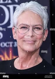 Hollywood actress Jamie Lee Curtis smiles as she sits in the House of Lords  Tuesday November 24 1998 while waiting for Britain's Queen Elizabeth II to  announce the Government's legislative plans for