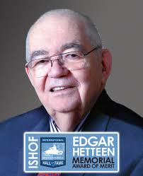 CJ and Bill Ryman at the I-250 directors' hospitality room in 1977.