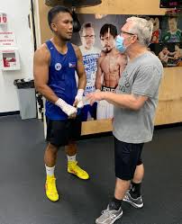 31, 2018, file photo, phillippines' eumir felix marcial, left, and uzbekistan's israil madrimov fight in their men's middleweight boxing semifinal at the 18th asian. Tragedy Strikes Filipino Boxing Prospect Eumir Felix Marcial After Elder Brother Dies Suddenly South China Morning Post