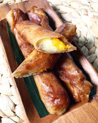 Also known as lumpiang saging (filipino for banana lumpia), is a philippine snack made of thinly sliced bananas (preferably saba or cardaba bananas), dusted with brown sugar, rolled in a spring roll wrapper and fried. Banana Turon With Mango