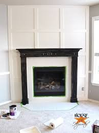 Black And White Fireplace Surround A Dramatic Fireplace Makeover White Moulding Black Mantel House Of Hepworths Fireplace Makeover Black Fireplace Brick Fireplace Makeover