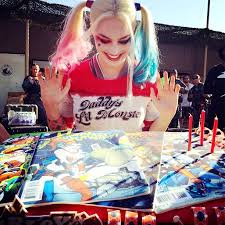 Pass this along to any batman fans you know! Margot Robbie Gets Harley Quinn Birthday Cake On Suicide Squad Set Ew Com