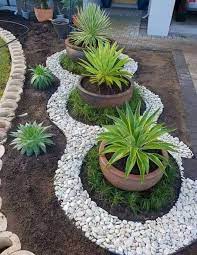 For instance, nearly every front yard benefits from utilizing a mixture of evergreens and colorful seasonal flowers. 60 Awesome Front Yard Rock Garden Landscaping Ideas Insidexterior Rock Garden Landscaping Front Yard Landscaping Design Garden Decor Projects