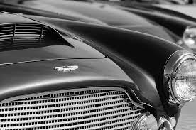 1960 Aston Martin Db4 Series Ii Grille Hood Emblem Photograph By Jill Reger