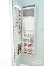 Decorative mirrors make spaces appear larger, create warmth, reflect light and add interest. How To Build A Mirrored Wall Mount Jewelry Cabinet Interior Frugalista