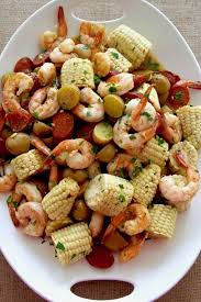 Although we call this a seafood bake it is actually simmered over a stove top. Sheet Pan Low Country Shrimp Boil Oven Bake No Boil Delicious Table