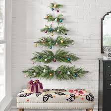 Decorating one's home this time of year us a pagan tradition anyway. This Wall Hanging Christmas Tree Is Perfect For Small Spaces Popsugar Home