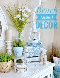 The wood floors carry a third shade of blue. Dining Delight Beach Themed Decor For The Kitchen Sideboard