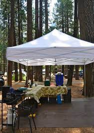 This Outdoor Cooking Set Up Appeals To Me For Longer Trips Plastic Tarp Floor Pop Up Gazebo L Table Countert Family Tent Camping Tent Camping Camping Set Up