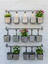 Recycled Pots To Create Your Very Own Miniature Herb Garden Diy Home Outdoorliving Garden Herb Garden Wall Herb Wall Vertical Garden Diy