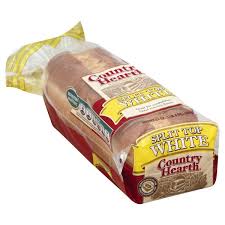 Bread is a staple food prepared from a dough of flour and water, usually by baking. Country Hearth Split Butter White Bread 24 Oz Walmart Com Walmart Com