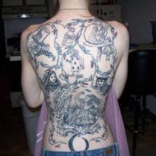 Black Alice In Wonderland Tattoos Lewis Carroll Alice In Wonderland Back Piece This Elaborate Black And Gray Back Piece Is Modeled After The Illus Wonderland Tattoo Alice In Wonderland Tattoos