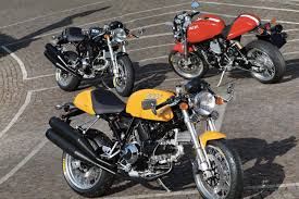 1 ドゥカティ sport1000 30514 スポーツ1000 【カスタム】ティグクラフト製スリップオンマフラー（td002）、アエラ製レリーズシリンダー30φ、アエラ製ハンドル、社外ミラー、リバースオートは認証工場完備。 Tron Legacy Motorcycle Ducati Sport 1000 Return Of The Cafe Racers