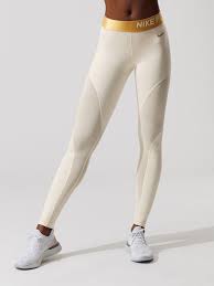 Black And Gold Nike Pro Leggings Nike Nike Pro Warm Women S 7 8 Tights Light Cream Metallic Gold 7 8 Length Leggings Womens Printed Leggings Nike Women Outfits Nike Outfits