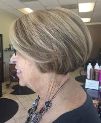 Short bobbed hair with side swept fringes. Short Bob With Highlights For Elderly Cool Hairstyles Short Hair Highlights Womens Haircuts