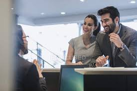 New car dealership cashier careers are added daily on simplyhired.com. Smiling Couple Customers Talking To Receptionist At Desk In Car Dealership Heterosexual Couple Mode Of Transport Stock Photo 202757022