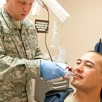 U.S Army Spc. Michael Keeling, left, a combat medic