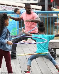 The move was a strategic one by the studio and not tied to injuries the actor. Kevin Hart Shows Off His Hula Hooping Skills To Several Children In A Scene For Fatherhood Daily Mail Online