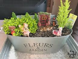 Many diy garden ideas use creative plant arrangements, beautiful flowers, and garden decorations. Our Hopeful Home How To Make A Fairy Garden On A Budget