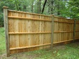 Fences help keep pets and young children in the yard, safer from dangerous situations. 6 High Traditional Style Cedar Fence With Colonial Cap Pressure Treated Posts Reliable Fence