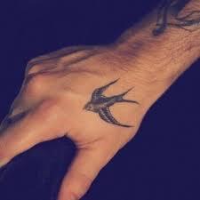 Swallow Bird Tattoo On Hand Meaning Tathunting For Swallows Swallow Tattoo Swallow Bird Tattoos Swallow Hand Tattoo