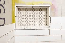 Use a circular object or another shape to trace around if you want to make any irregular cuts. Master Shower Seven In A Series Wall Tiling Flipping The Flip