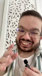 Men's Fashion Outfit Breakdown featuring White Shirt with Green Stripes and  Khaki Trousers