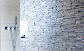 Glass blocks transmit light but preserve privacy. Natural Stone Shower Walls Stacked Stone Veneer Panels For Shower Walls