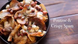 Poutines rapees are a mixture of raw grated potatoes, combined with cooked and mashed potatoes, which are then formed into a ball, stuffed with seasoned salted pork and simmered in salt water. Poutine Crispy Spam Classic Youtube