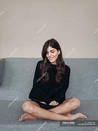 We did not find results for: Woman Sitting Cross Legged On Couch Full Length Female Stock Photo 164884780