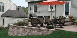 Using pavers to create your patio is economical and allows you to build an endless variety of shapes, sizes and colors. Build A Retaining Wall With Block Units Patio Redesign Ideas