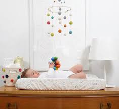Mobiles Aren T Just For The Crib Hanging A Mobile Above The Change Table Is A Great Way To Nursery Changing Table Nursery Wall Decor Boy Baby Changing Tables