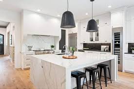 Dark granite countertops add depth to this california home's bright kitchen. Kitchen Countertop Ideas With White Cabinets Designing Idea