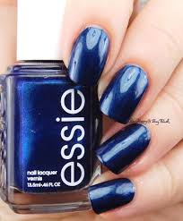 This has a blackened effect around the edges and it's so pigmented, you almost just need one coat. Essie Be Happy And Buy Polish