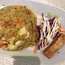 American fried rice is a thai chinese fried rice dish with american side ingredients like fried chicken, ham, hot dogs, raisins, ketchup. Vegetarian Express Cafe Pineapple Fried Rice With Otak Reviews Abillion