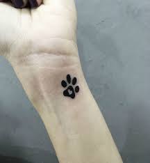 You can try out something like this. 41 Dog Tattoos To Celebrate Your Four Legged Best Friend Sheknows