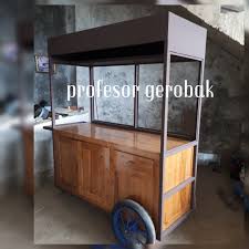 Gerobak gorengan perencanaan dalam mengembangkan gerobak jualan makanan khususnya gorengan menjadi bisnis kuliner masa kini,yang mampu bersaing di ketatnya kompetitor adalah menyiapkan desain gerobak unik yang mampu menjadi daya tarik konsumen. Gerobak Kayu Jati Minimalis Modern Dari Kota Ukir Jepara Profesor Gerobak Jualan Jasa Pembuatan Gerobak Custom Kitchen Set Minimalis Meja Kursi Cafe Minimalis