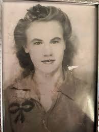 Help opening eyes in old photo?