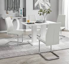 On sale for $223.46 original price $319.00. Imperia Modern White High Gloss Dining Table And 4 Lorenzo Chrome Leather Dining Chairs Set White Table White Lorenzo Chairs Buy Online In Bahamas At Bahamas Desertcart Com Productid 100802272